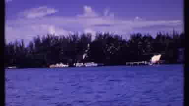 Bahamas (1969): Police Officer Wearing White Shirt Directing Traffic On A Bright