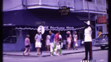 Bahamas (1969): Traffic Police Stopping A Car And A Woman Walking On A Harbor With