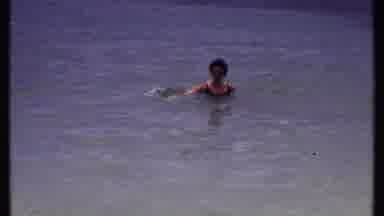 Bahamas (1969): Person In Water Swimming As She Watches Over The Person Filming