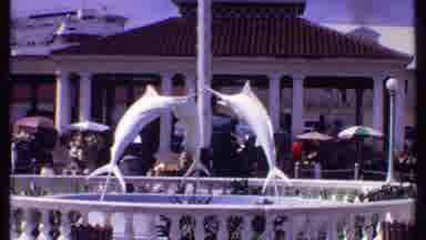Bahamas (1969): A Hot Day With Many Colorful Umbrellas And A Marlin Fountain In