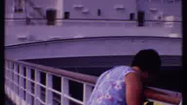 Bahamas (1969): Couple In Cruise Ship With Man Looking At Camera