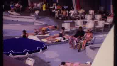 Bahamas (1969): People Sitting On Chairs By Poolside Hanging Out And Talking