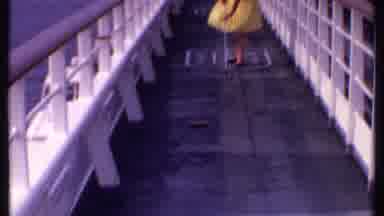 Bahamas (1969): Woman On Board A Ship Engages In Shuffleboard From A Distance Then