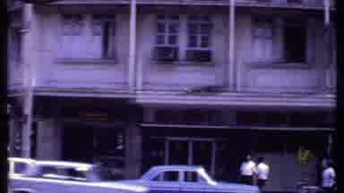 India (1969): A Group Observing A Ship