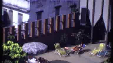 India (1969): Woman Is Enjoying The Warm Weather In Her Backyard Alone