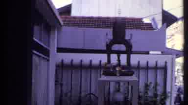 India (1969): Object In Front Of A House Being Appreciated By A Person And A Woman
