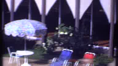 India (1969): Pool Chairs Table Umbrella And Pool With Man Swimming Backwards