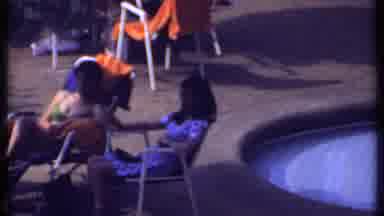 India (1969): Six People Talking And Sitting In Chairs Outside Near A Pool