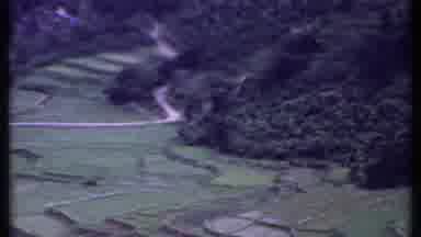 India (1969): Aerial Mountainside And Fields With Water In The Background