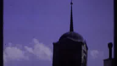 Kenya (1969): A Spire On Top Of A Church Tower Bell Rises Towards The Blue Sky Far