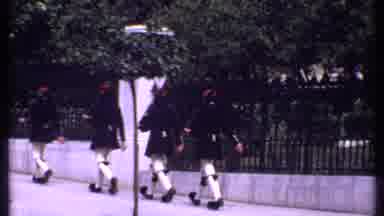 Kenya (1969): Four Soldiers March Then Shot Moves To Swans Floating In A Lake