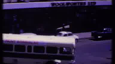Kenya (1969): Bus Starts Then Halts As Bike Passes And Traffic Patrolman Observes