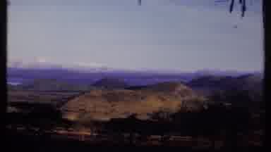 Kenya (1969): Sweeping High Angle A Mountainous Land Partially Covered In Clouds
