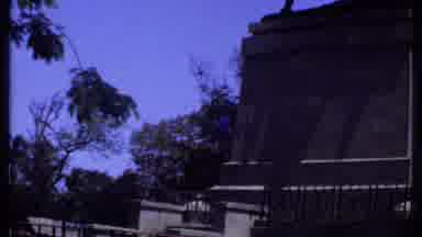 Kenya (1969): Blue Truck Drives By Stone Steps And Iron Gates On A Clear Sunny Day