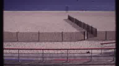 New London Connecticut (1969): Camera Pans An Unoccupied Beach That Is Sectioned