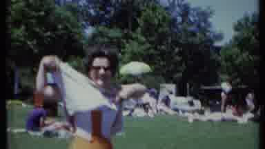 California USA (1971): Woman Shimmies As She Pulls Off Her Top Then Another Woman
