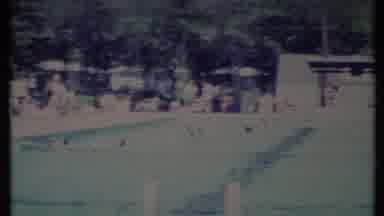 California USA (1971): Shot Pans Front Of House Then Sweeps Passed Huge Swimming