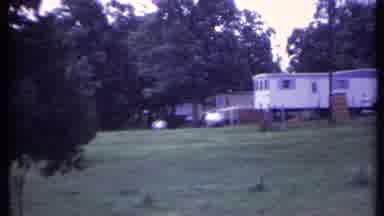 California USA (1971): House On A Hill With Trees Camera Pan To The Left