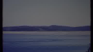 California USA (1971): Driver Records Waves Gently Rolling Ashore In Narrow Bay