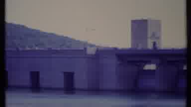 California USA (1971): People Visiting A Huge Water Dam That Is Close To A