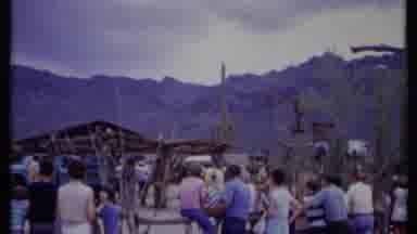 California USA (1971): People Standing In Larger Groups On A Ranch During The Day