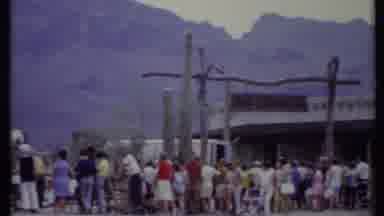 California USA (1971): People Look On As Lightning Lights Up The Mountaintop