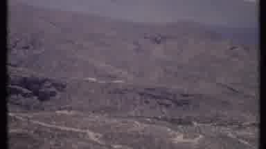 California USA (1971): Birdseye Arid Desert Landscape With Dirt Trails And Shrubs