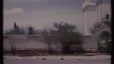 California USA (1971): A Wall With White Structure Beside And Behind The Wall