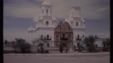 California USA (1971): White Building With Brown Details And Green Car Parked