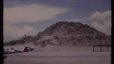 California USA (1971): Tourist Out Exploring Zooming In On A Small Mountain They
