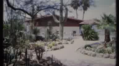 California USA (1971): Old Footage Of A Building Surrounded By A Lot Of Trees