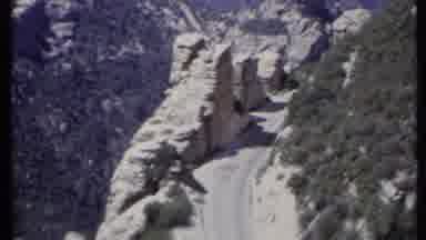 California USA (1971): A Road Carved Into A Rocky Outcropping On The Side Of A