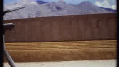 California USA-1971: Adobe Structure and Rocky Mountain Landscape