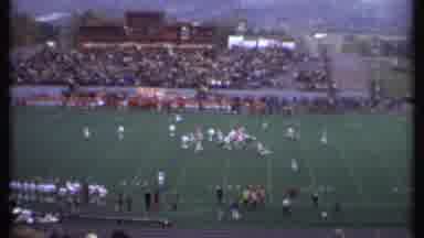 Ithaca New York (1979): High Angle A Football Game During A Running Play