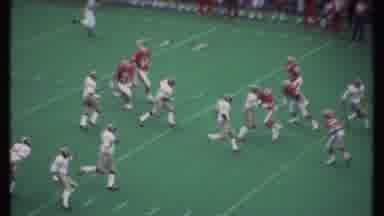 Ithaca New York (1979): Football Game Taking Place Outdoors With A Full Stadium