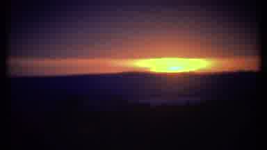 Ithaca New York (1979): Bright Orange Sun Shining Through Clouds With Dark Blue