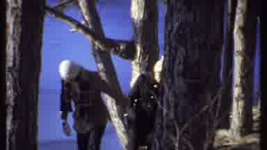Ithaca New York (1979): People Walking Through Woods Near Lake In The Winter