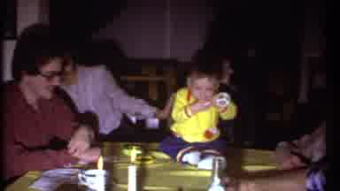 Ithaca New York (1979): Family Talking Around A Table As Kid Sits On Table