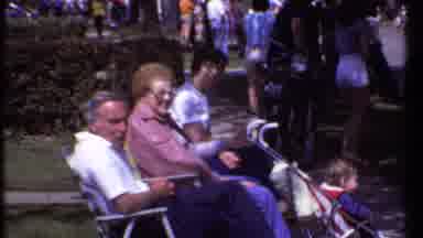 Ithaca New York (1979): People Sitting On Road Waiting For Something To Start