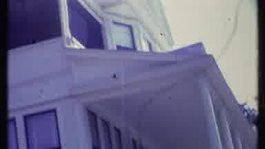 Vermont USA (1984): Woman Cautiously Makes Way Up Stairs To A White House