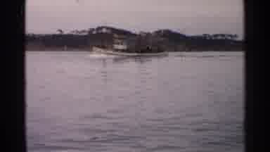 Japan (1952): White Tugboat In Water On A Clear Day