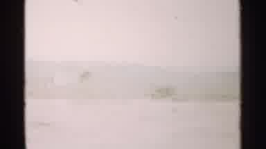 Japan (1952): Green Hills With Mountains In The Background And White Hills During