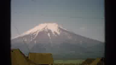 Japan (1952): Snow Capped Mountain Above A Village