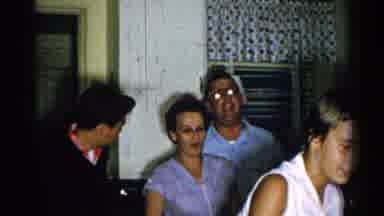 New Hampshire (1952): A Group Of Young Happy People Laughing And Talking In A
