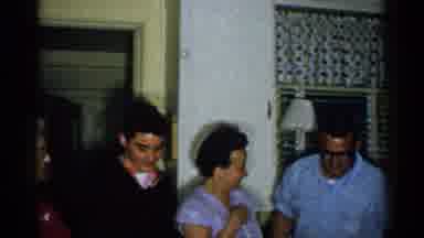 New Hampshire (1952): Five People In A Family Gathering At Night Talking And