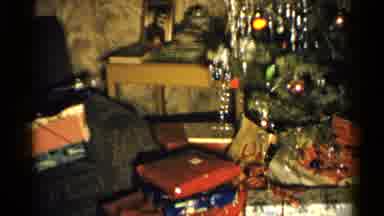 New Hampshire (1952): Man Wearing Glasses Dressed Festive Sitting On Couch Next To
