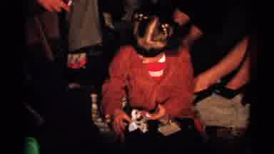 New Hampshire (1952): A Family Gathering Where A Little Girl Unwraps A Gift Then