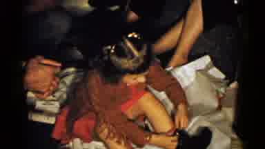 New Hampshire (1952): Girl Wearing Red Dress Opens A Light Pink Gift Box