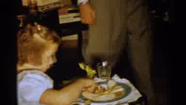 New Hampshire (1952): Home Footage Of A Child Eating Food And Man Pointing At The
