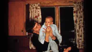 New Hampshire (1952): Woman Holds Baby Then Wipes His Face Then Points And Talks